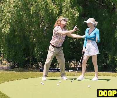 Big boobs blonde MILF takes two big tranny dicks at golf practice